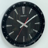 Настенные черные часы Seiko QXA802K